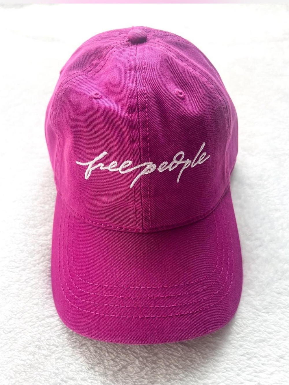 magenta Free People baseball cap featuring contrasting white embroidered logo OS